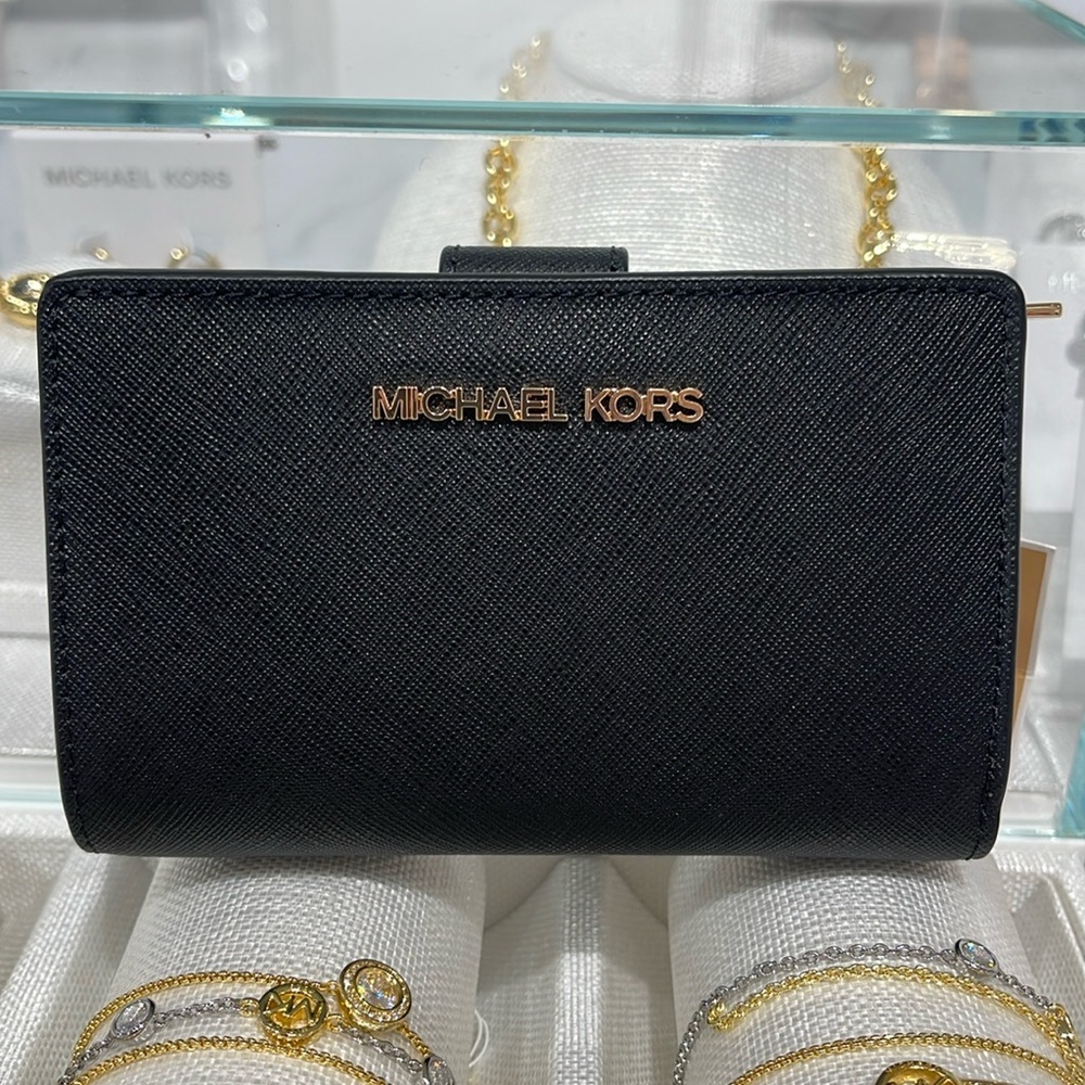 Michael Medium Crossgrain Leather Bifold Wallet
Black 
NWT
